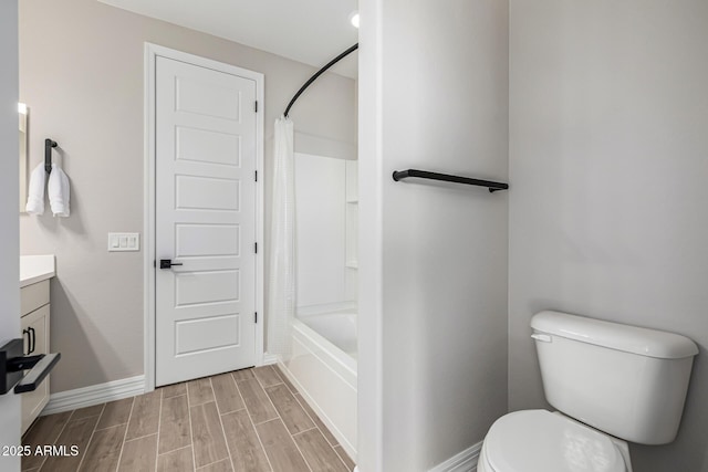 25725 S 230th St, Queen Creek, AZ 85142 - full bath featuring shower / bath combination with curtain, wood finished floors, toilet, vanity, and baseboards