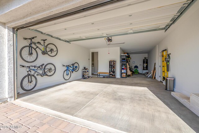 25725 S 230th St, Queen Creek, AZ 85142 - garage with gas water heater and a garage door opener