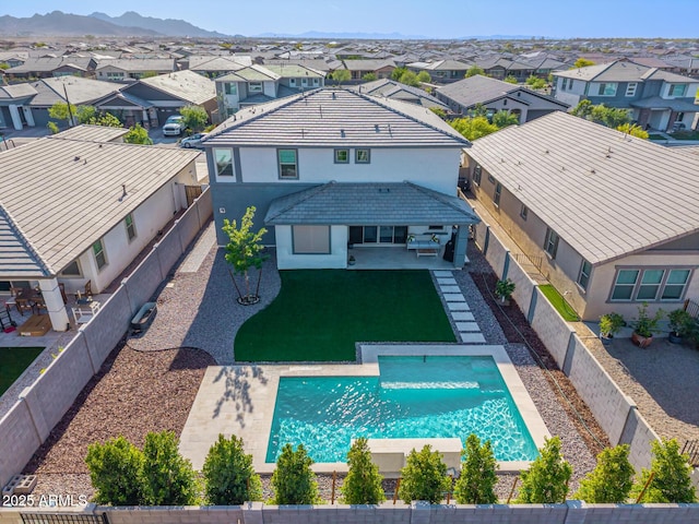 25725 S 230th St, Queen Creek, AZ 85142 - exterior space featuring a residential view, a patio area, a fenced in pool, and a fenced backyard