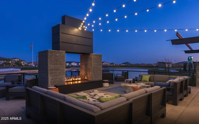 25725 S 230th St, Queen Creek, AZ 85142 - patio at twilight featuring an outdoor living space