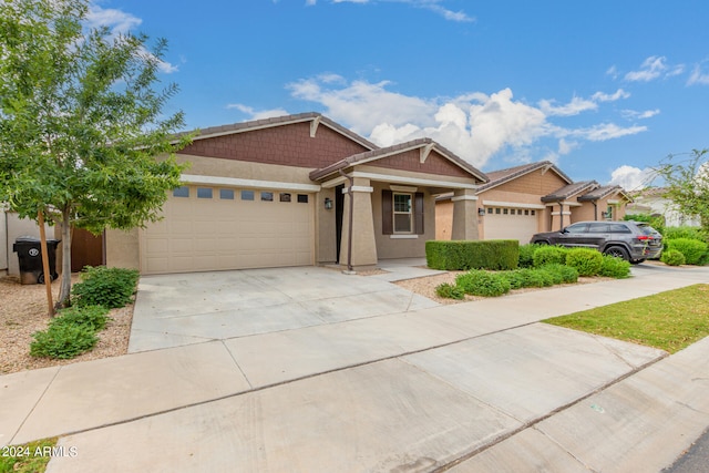 view of front of property featuring a garage