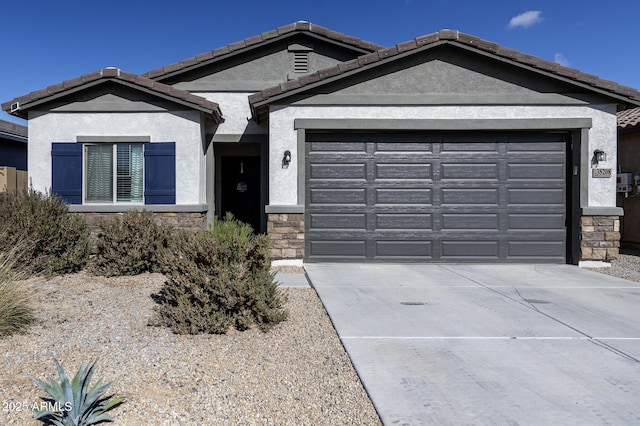 ranch-style home featuring a garage