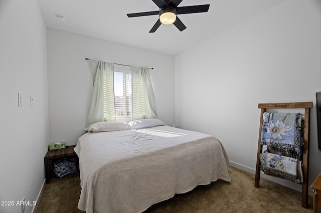 bedroom with dark carpet and ceiling fan