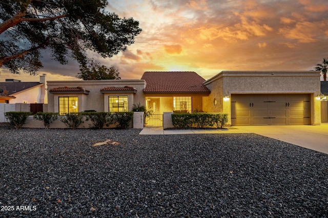 view of front of home featuring a garage