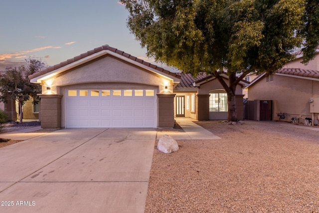 view of front of home with a garage