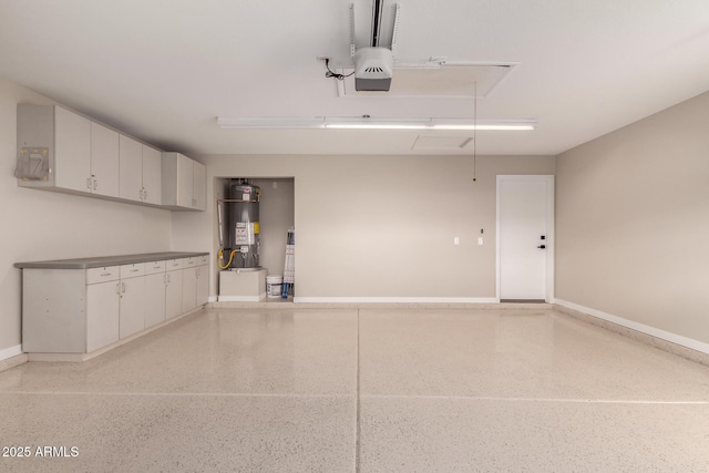 garage featuring a garage door opener and gas water heater