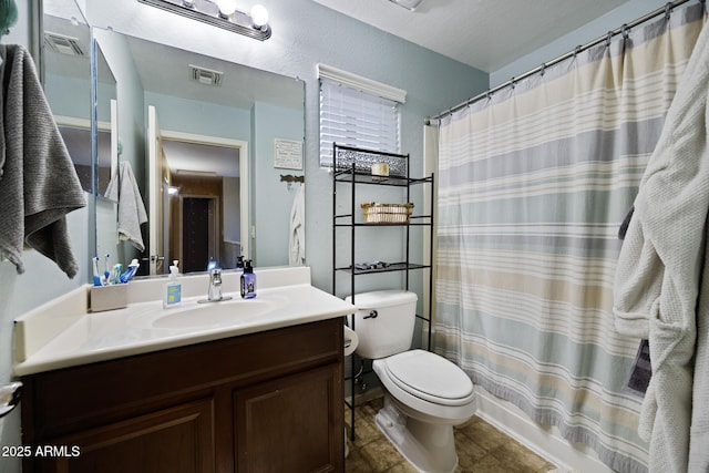 full bathroom with vanity, curtained shower, toilet, and visible vents