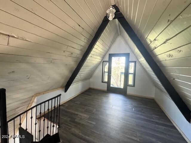 bonus room with wooden ceiling, vaulted ceiling, and dark wood-type flooring