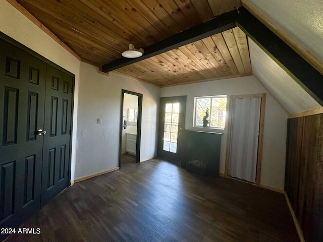 foyer entrance with vaulted ceiling with beams, wood ceiling, and dark wood-type flooring