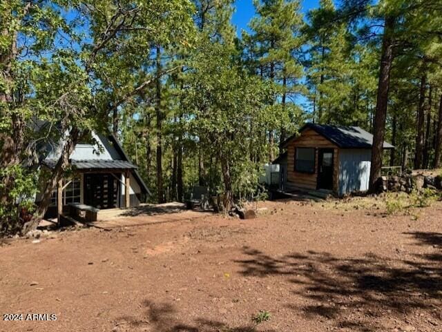 1725 Turkey Mountain Rd, Happy Jack, AZ 86024 - view of yard with an outbuilding