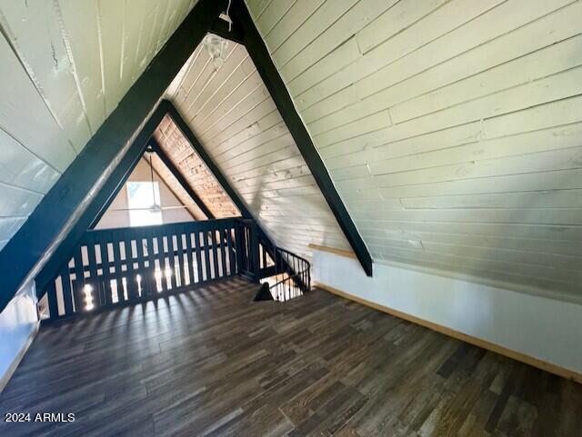 1725 Turkey Mountain Rd, Happy Jack, AZ 86024 - additional living space with wooden ceiling, vaulted ceiling with beams, baseboards, and wood finished floors