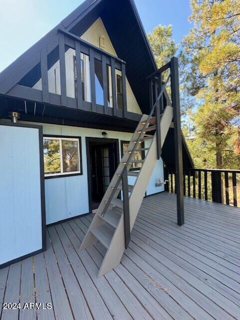 1725 Turkey Mountain Rd, Happy Jack, AZ 86024 - wooden terrace with stairway