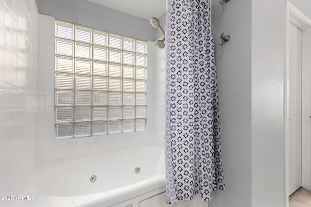 bathroom featuring shower / bath combination with curtain