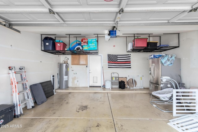 garage featuring a garage door opener, stainless steel fridge with ice dispenser, and electric water heater