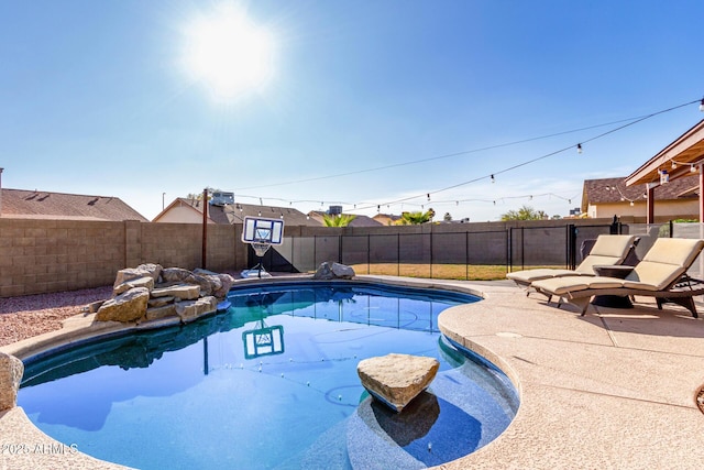 view of pool with a patio area