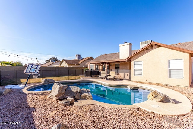 view of pool featuring a patio