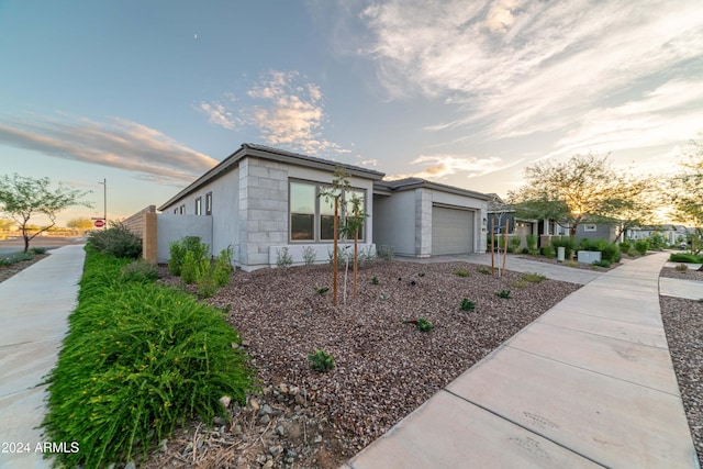 view of front of property with a garage