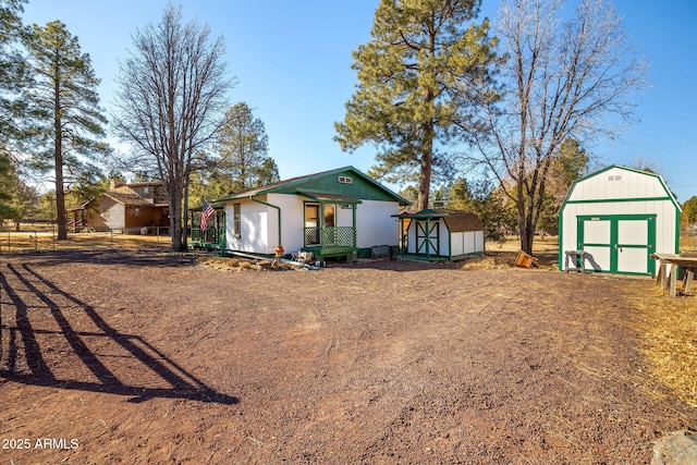 exterior space with a shed