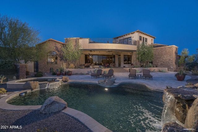 9161 E Superstition Mountain Dr, Gold Canyon, AZ 85118 - view of pool with ceiling fan and a patio