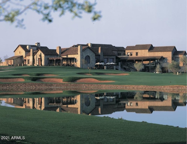9161 E Superstition Mountain Dr, Gold Canyon, AZ 85118 - view of home's community featuring a water view and a lawn