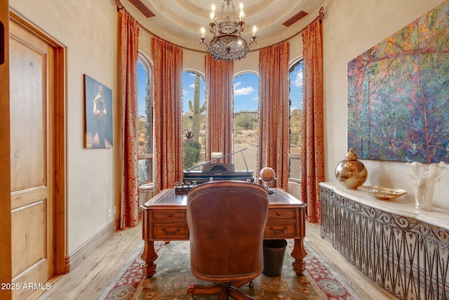9161 E Superstition Mountain Dr, Gold Canyon, AZ 85118 - office space with an inviting chandelier, light hardwood / wood-style floors, and a raised ceiling
