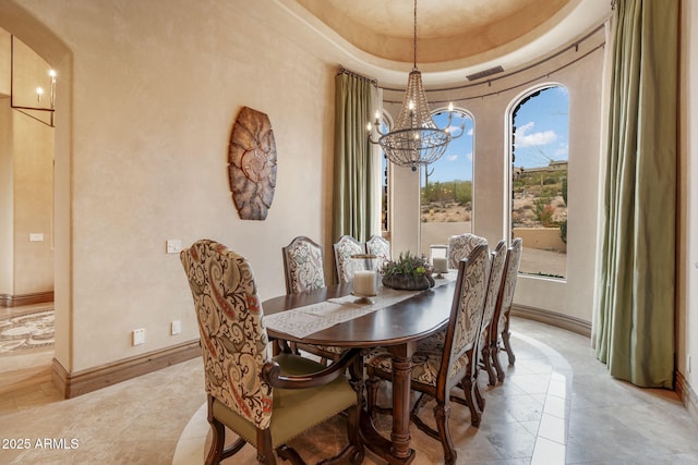 9161 E Superstition Mountain Dr, Gold Canyon, AZ 85118 - dining room with an inviting chandelier and a tray ceiling