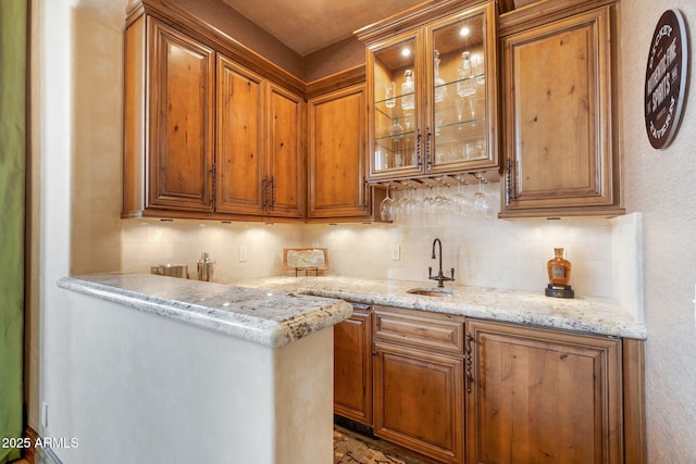 9161 E Superstition Mountain Dr, Gold Canyon, AZ 85118 - interior space featuring sink, light stone counters, and tasteful backsplash