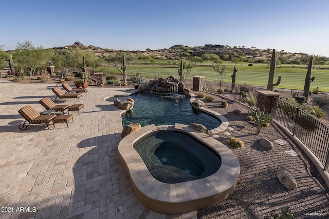 9161 E Superstition Mountain Dr, Gold Canyon, AZ 85118 - view of swimming pool with a patio, an in ground hot tub, and pool water feature