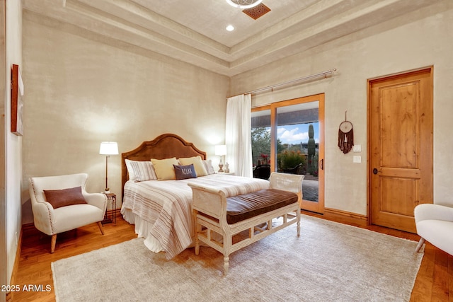 9161 E Superstition Mountain Dr, Gold Canyon, AZ 85118 - bedroom featuring hardwood / wood-style floors and access to exterior