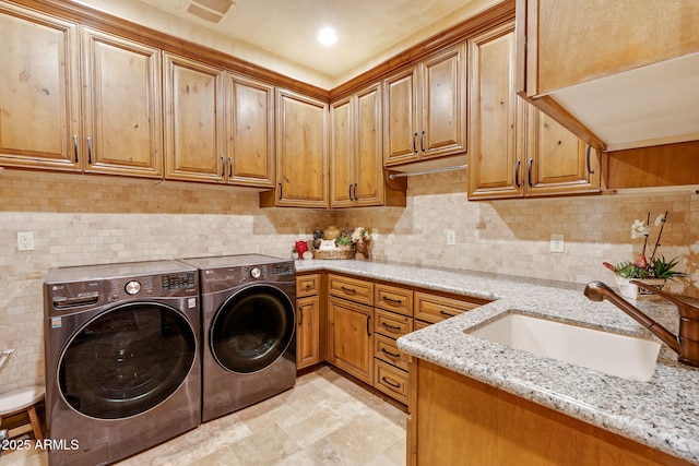9161 E Superstition Mountain Dr, Gold Canyon, AZ 85118 - clothes washing area featuring sink, cabinets, and separate washer and dryer