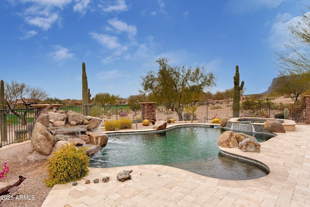 9161 E Superstition Mountain Dr, Gold Canyon, AZ 85118 - view of pool featuring a patio, pool water feature, and an in ground hot tub