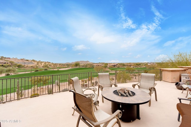 9161 E Superstition Mountain Dr, Gold Canyon, AZ 85118 - view of patio / terrace with an outdoor fire pit