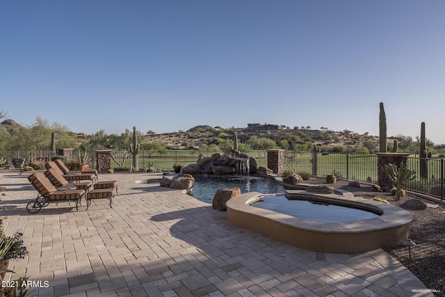 9161 E Superstition Mountain Dr, Gold Canyon, AZ 85118 - view of pool with an in ground hot tub and a patio area