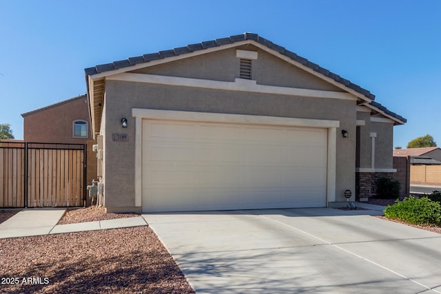 view of side of home featuring a garage