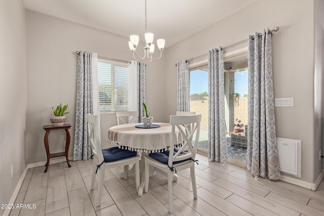 dining area with a chandelier