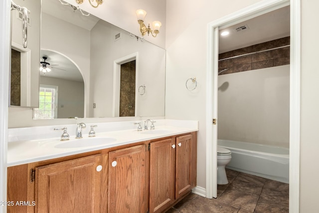 16216 N Runyon Pl, Fountain Hills, AZ 85268 - bathroom featuring toilet, double vanity,  shower combination, and a ceiling fan