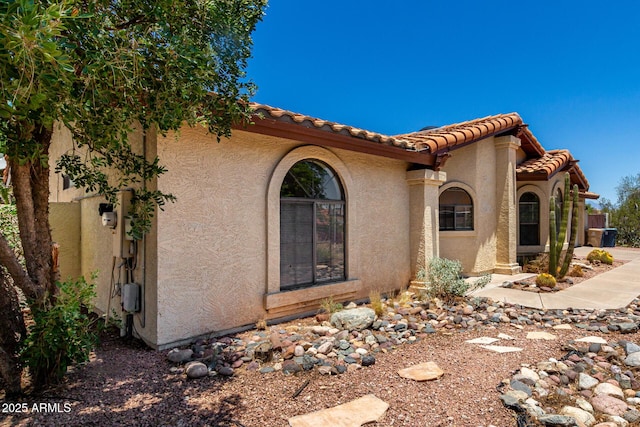 16216 N Runyon Pl, Fountain Hills, AZ 85268 - view of side of property featuring stucco siding and a tile roof