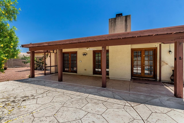 16216 N Runyon Pl, Fountain Hills, AZ 85268 - rear view of house with french doors, a chimney, stucco siding, and a patio area