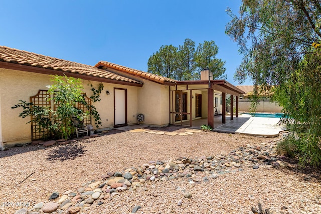 16216 N Runyon Pl, Fountain Hills, AZ 85268 - rear view of house featuring a tile roof, a patio, and stucco siding
