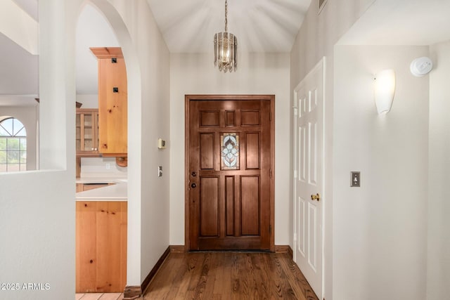 16216 N Runyon Pl, Fountain Hills, AZ 85268 - entrance foyer with arched walkways, dark wood finished floors, and baseboards