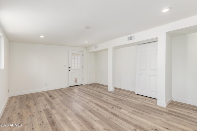 basement with light wood-type flooring