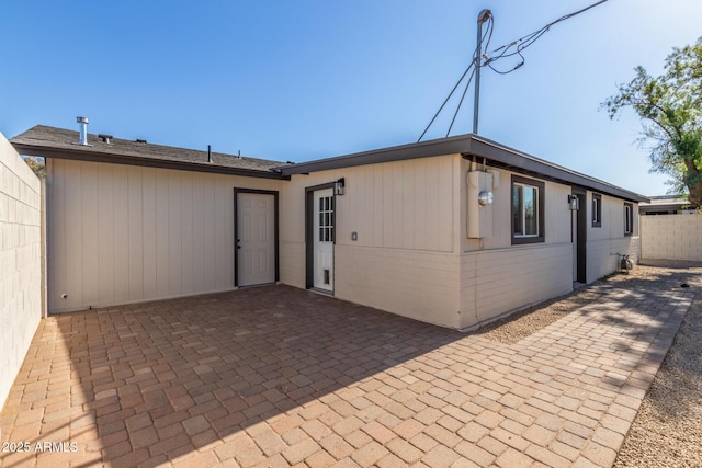 back of property featuring a patio