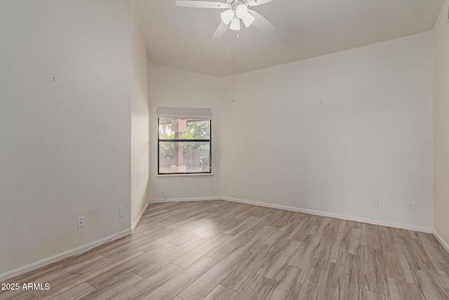 spare room with ceiling fan and light hardwood / wood-style floors