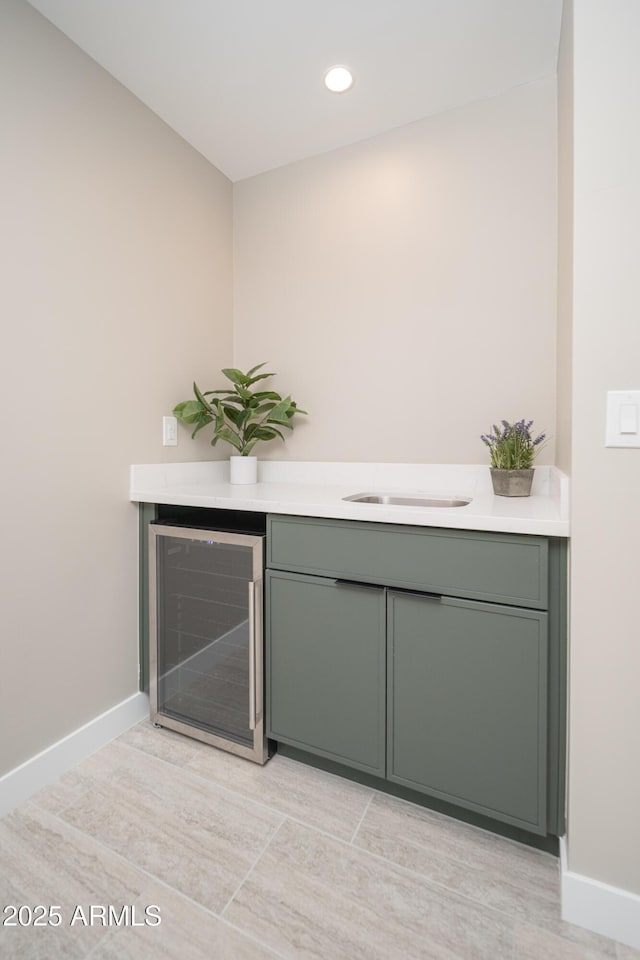 4506 W Golden Ln, Glendale, AZ 85302 - bar featuring wine cooler, recessed lighting, and baseboards