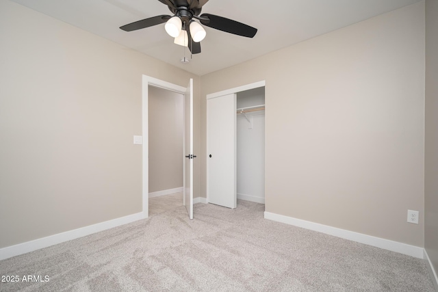 4506 W Golden Ln, Glendale, AZ 85302 - unfurnished bedroom featuring a closet, baseboards, a ceiling fan, and carpet floors