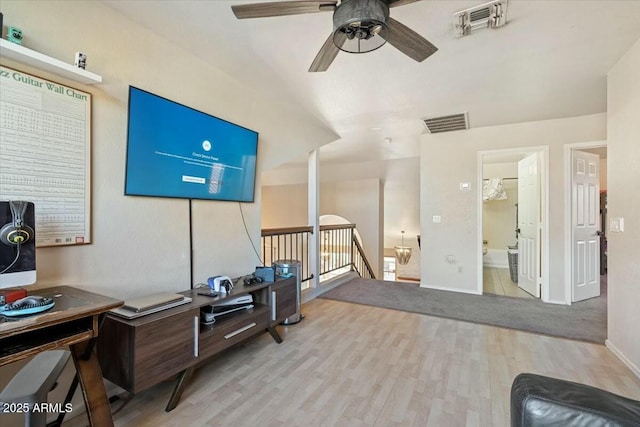 office featuring ceiling fan and light hardwood / wood-style floors