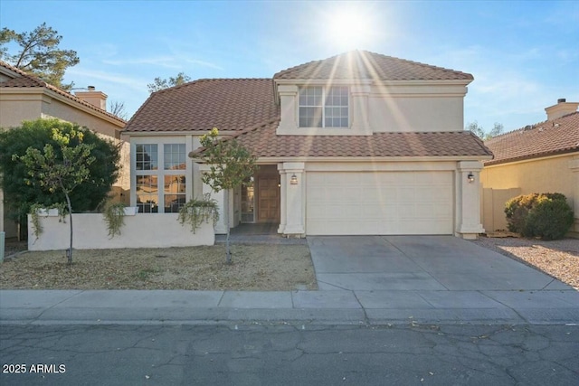 view of front of home with a garage