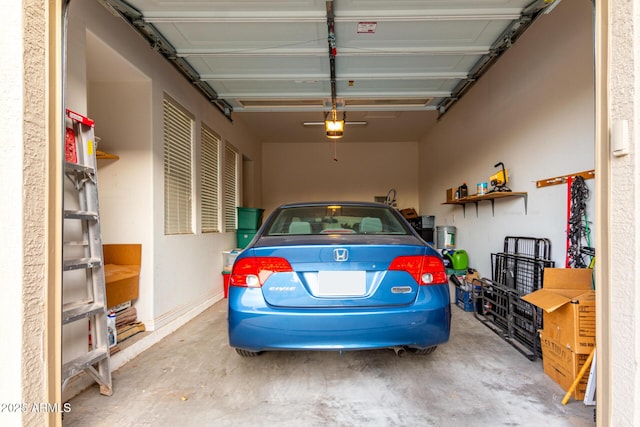 garage featuring a garage door opener