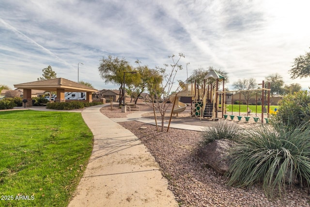 view of playground with a gazebo and a yard