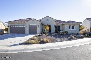 mediterranean / spanish-style house with a garage